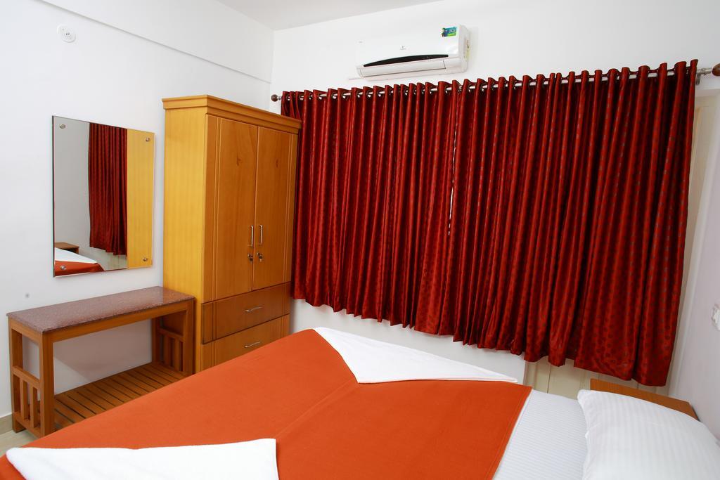 Phils' Residency & Banquets Hotel Kochi Szoba fotó