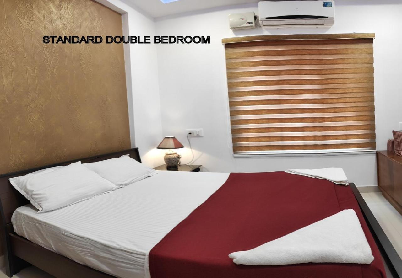 Phils' Residency & Banquets Hotel Kochi Kültér fotó
